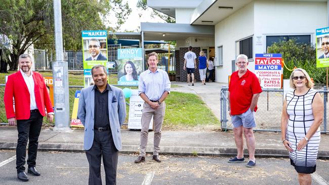 Logan City Council Mayoral candidates (left to right) Stewart Fleming, Paul Taylor, Darren Power, John Freeman and Sherry Heath pose for a photograph, Saturday, March 28, 2020 (AAP Image/Richard Walker)