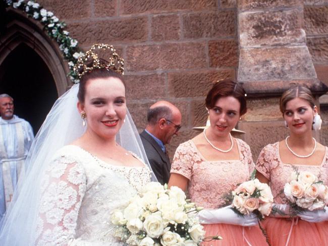 Toni Collette (left) and Sophie Lee (second from right) in a scene from Muriel’s Wedding.