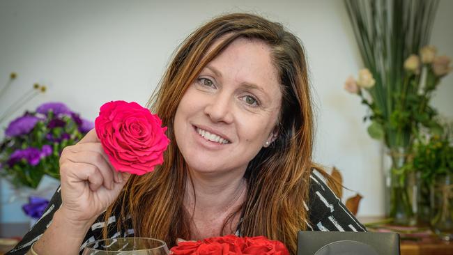 Melissa Clark with some preserved roses from Port Blooms. Picture: AAP/Roy VanDerVegt