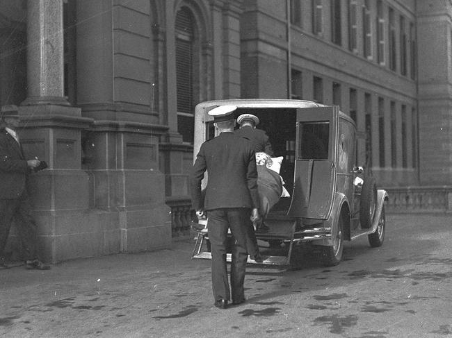 Woman patient brought by ambulance to RPA Camperdown July 1933. Picture: State Library of NSW