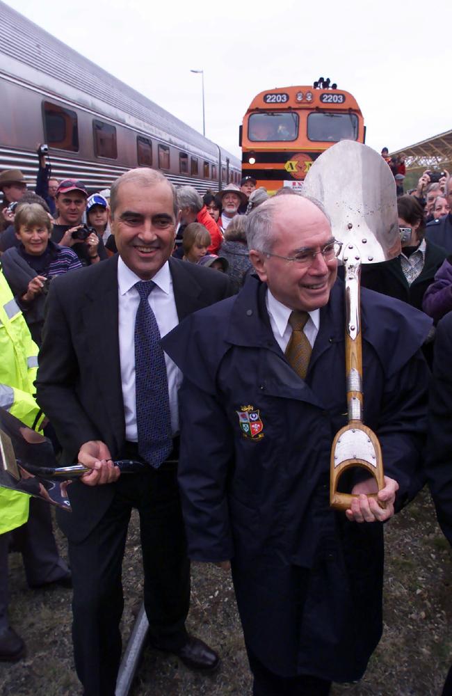 John Olsen and John Howard about to turn the first sod of the Alice Springs-Darwin railway on July 17 2001.