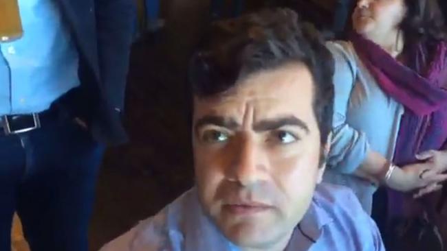 Sam Dastyari copped racist taunts in a Melbourne Pub in a video posted to Facebook by the far right group 'Patriot Blue'. (Pic: Facebook.)