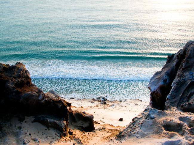 Man fighting for life after near-drowning at Qld beach