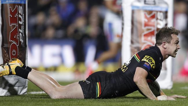 Dylan Edwards scores the try that effectively put the contest beyond reach for the Knights. Picture: Getty Images