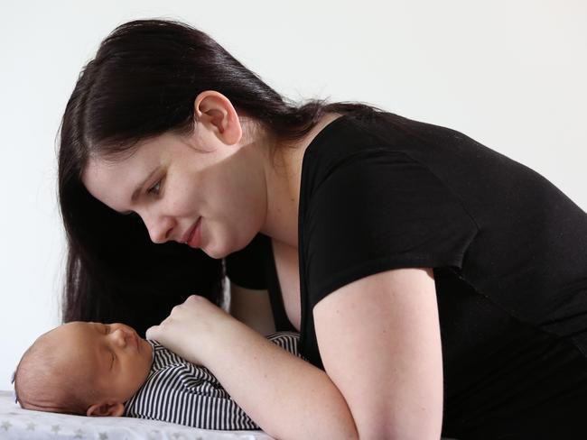 Ally Rose and her new born son Elijah at their Mt Annan home. Picture: Robert Pozo