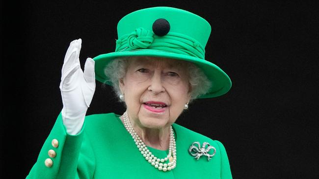 Queen Elizabeth waves to the crowd from Buckingham Palace at the end of the Platinum Pageant in London on June 5. Picture: AFP