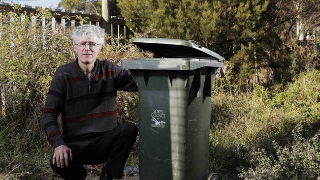 Peter McGlone, of Dodges Ferry, with his unsued rubbish bin. Picture: ZAK SIMMONDS