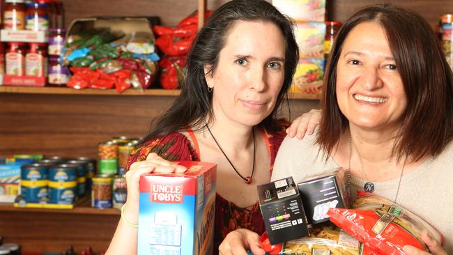 Darebin Information Volunteer and Resource Service received $10,000 to buy food and $3260 for equipment during the Feed Melbourne Appeal. Pictured are volunteer Kathleen Phillips and program development leader Nevin Cetiner. Picture: Janine Eastgate.