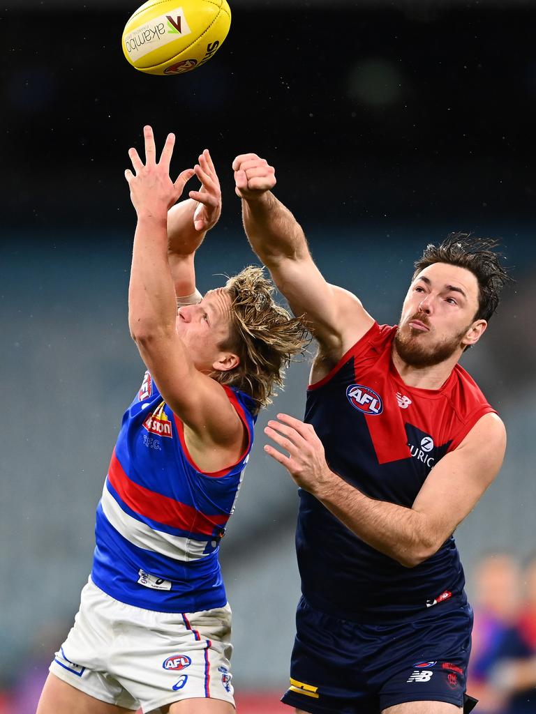 Michael Hibberd knocks the ball away from Cody Weightman.