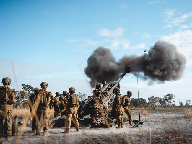 Australian Army Gunners from the 103rd Battery, 8th/12th Regiment, Royal Australian Artillery fire the M777A2 howitzer at Mount Bundey Training Area as part of Exercise Predator's Walk. *** Local Caption *** Soldiers from the 8th/12th Regiment, Royal Australian Artillery conduct training at Mount Bundey Training Area as part of Exercise Predator’s Walk 2024. Over the course of a few weeks, soldiers conducted urban operation training and a combined arms live-fire exercise, firing in support of the 5th Battalion, The Royal Australian Regiment and other call signs.