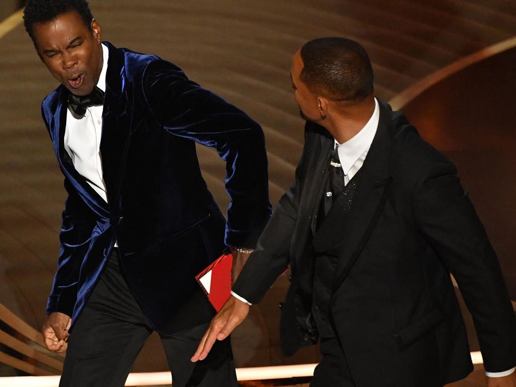 Will Smith (R) slaps Chris Rock onstage during the 94th Oscars at the Dolby Theatre in Hollywood, California. (Photo by Robyn Beck / AFP)