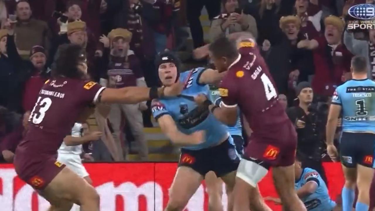 Matt Burton and Dane Gagai trade punches in Origin 3. Source Fox League