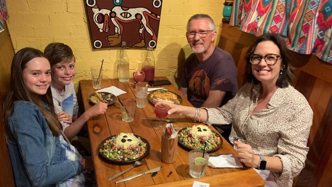 Broadbeach local Stacey Joseph with her children Isabella and Oliver, took their family friend Mark Drewett out for dinner at Montezuma's Mexican restaurant and bar before it moves from the Burleigh Heads arcade its been at since 1978.