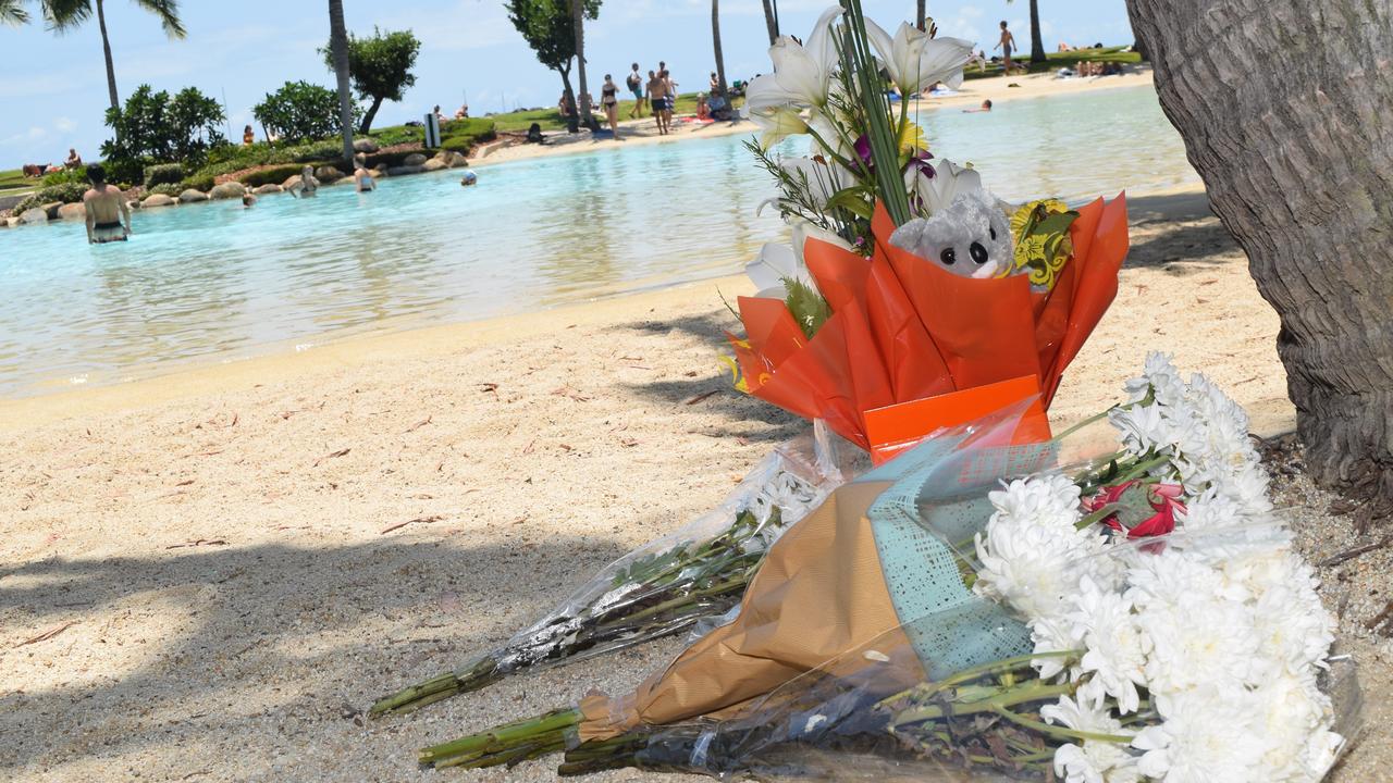 Tributes were left at Airlie Beach Lagoon after 30-year-old Yuanwei Zhang and his five-year-old son Chenxi drowned on Sunday, October 28, 2018.