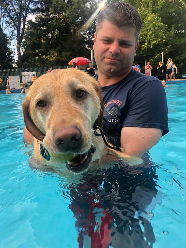 Rachel Mudford’s husband and labrador Ty at Belgrave Outdoor Pool dog day in 2019. Picture: Rachel Mudford