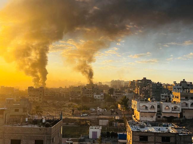 Smoke billows after Israeli strikes on Beit Lahia, in the northern Gaza Strip on October 22, 2024, amid the ongoing conflict between Israel and the Palestinian Hamas militant group. (Photo by AFP)