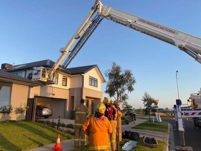 A ladder platform was called in to rescue a Werribee man stuck on his garage after he fell from a second story roof while installing a TV antenna.