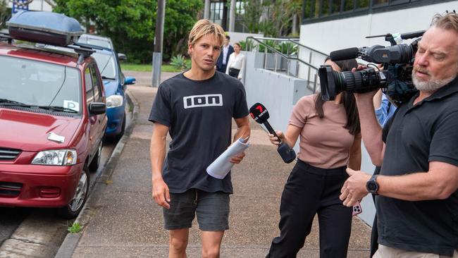 The Peregian Springs man told awaiting media after his release from the watch-house he could still instruct adults in his surfing school with his bail conditions. Picture: Patrick Woods