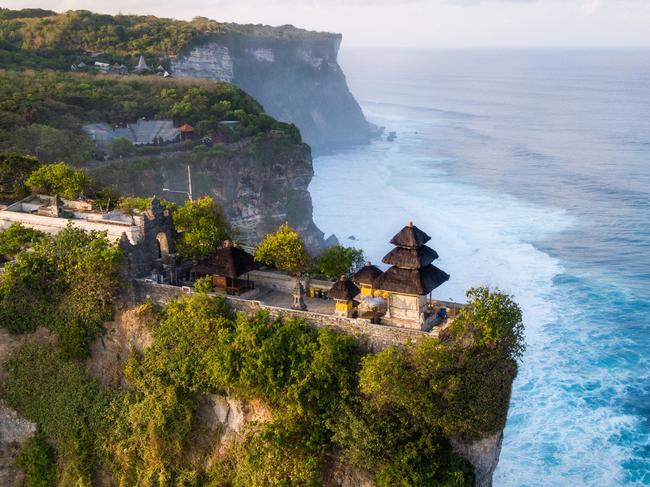 Bali, Indonesia, aerial view of Pura Luhur Uluwatu temple at sunrise.Escape 12 May 2024Why I TravelPhoto - iStock