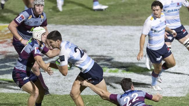 Action in the trial match between the NSW Waratahs and the Queensland Reds.