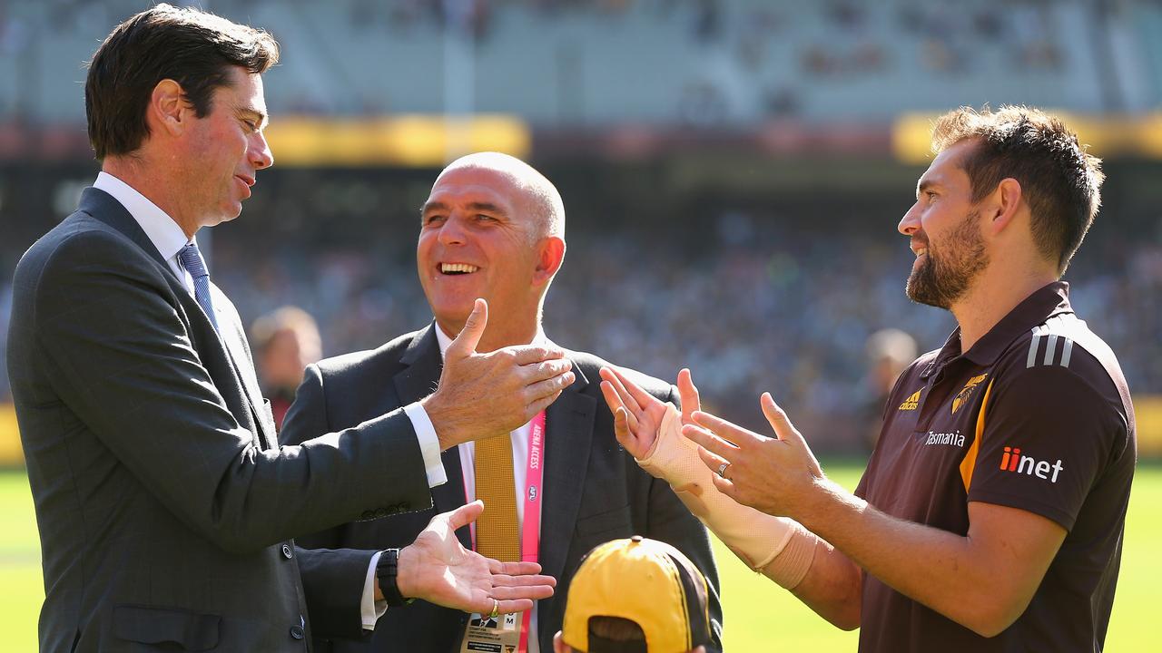 AFL CEO Gillon McLachlan (L) with Luke Hodge (R). Picture: Getty Images