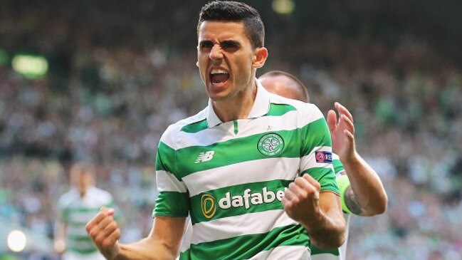 Tom Rogic celebrates scoring the opening goal during the UEFA Champions League play-off. Picture: Getty Images