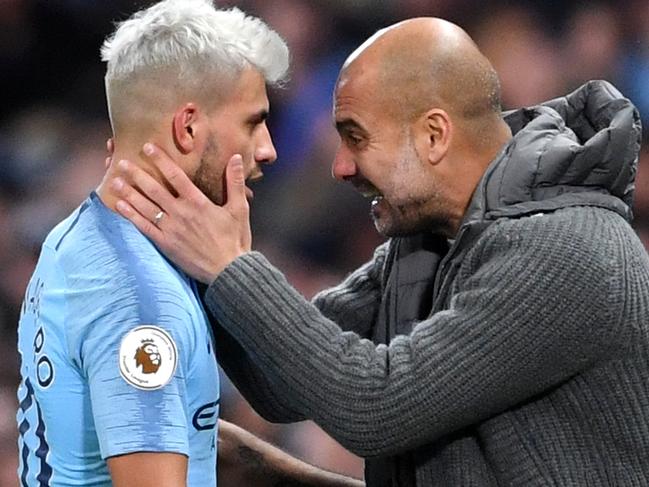 MANCHESTER, ENGLAND - NOVEMBER 11:  Sergio Aguero of Manchester City is embraced by Josep Guardiola, Manager of Manchester City as he is substituted during the Premier League match between Manchester City and Manchester United at Etihad Stadium on November 11, 2018 in Manchester, United Kingdom.  (Photo by Laurence Griffiths/Getty Images)