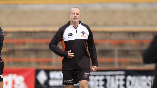 SYDNEY, AUSTRALIA – JUNE 01: Head Coach Michael Maguire looks on during a Wests Tigers NRL training session at Leichhardt Oval on June 01, 2021 in Sydney, Australia. (Photo by Mark Evans/Getty Images)