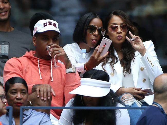 armelo Anthony, Kelly Rowland and his wife La La Anthony attend the third round victory of their friend Serena Williams on day 6 of the 2016 US Open at USTA Billie Jean King National Tennis Center on September 3, 2016. Picture: Getty