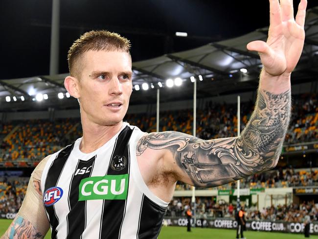 Dayne Beams of the Magpies celebrates winning the Round 5 AFL match between the Brisbane Lions and the Collingwood Magpies at the Gabba in Brisbane, Thursday, April 18, 2019. (AAP Image/Darren England) NO ARCHIVING, EDITORIAL USE ONLY