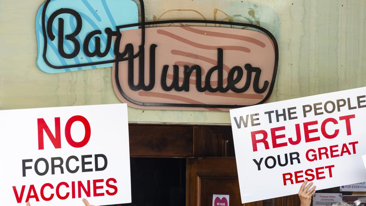 People protest outside Bar Wunder after the bar was shut down over failing to comply with the public health direction, Friday, December 24, 2021. Picture: Kevin Farmer