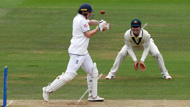 You won’t find this shot in a cricket textbook. England's Harry Brook is caught out by Australia's Pat Cummins (not seen) off a Mitchell Starc short ball. (Photo by Ian Kington / AFP)