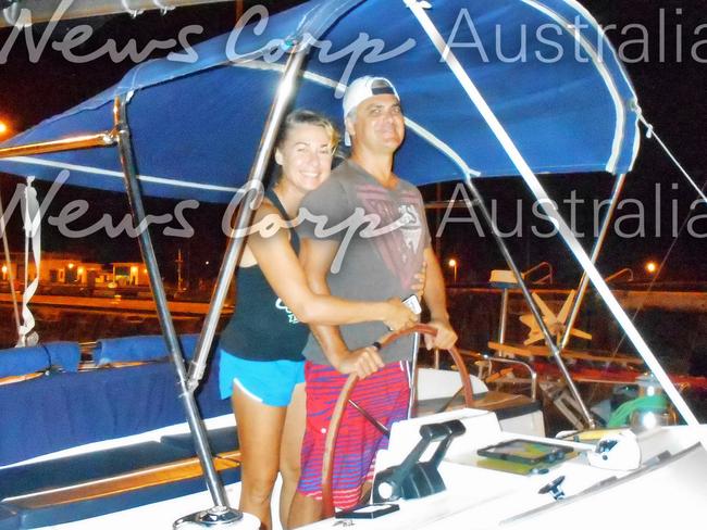 Yvette and John Nikolic loved-up on their yacht Shenanigans. Picture: Jeff Hassell.