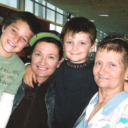 Alex Neal-Bullen with his mum Sharon, brother Patrick and grandmother and champion jockey Cheryl Neal. Picture: Supplied/Sharon Neal-Bullen.