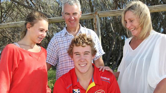 Then-rookie Tom Lynch with dad Peter Lynch, mum Maria Lynch and sister Bethany Lynch on the Gold Coast.