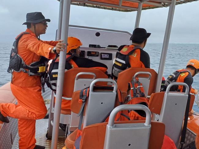 The National Search and Rescue Agency (BASARNAS) personnel at work. Picture: Handout / NATIONAL SEARCH AND RESCUE AGENCY / AFP