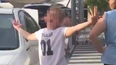 Image from a video of a child who jumped on a car at Westfield Helensvale car park.