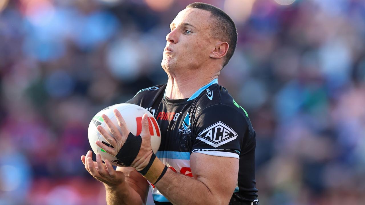 NEWCASTLE, AUSTRALIA - AUGUST 27: Connor Tracey of the Sharks catches a bomb during the round 26 NRL match. between Newcastle Knights and Cronulla Sharks at McDonald Jones Stadium on August 27, 2023 in Newcastle, Australia. (Photo by Jenny Evans/Getty Images)