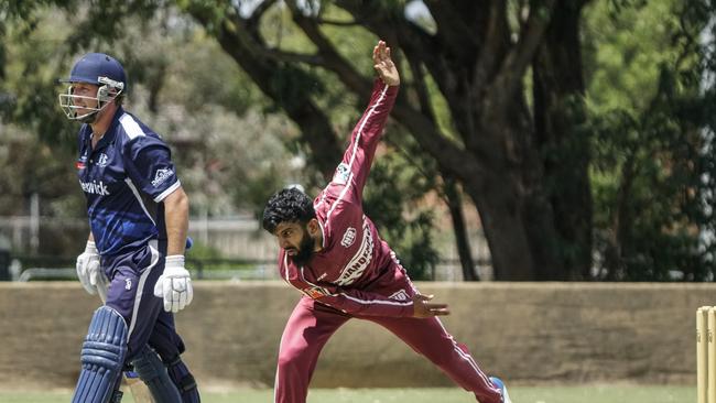 Javed Khan lets fly for North Dandenong against Berwick.