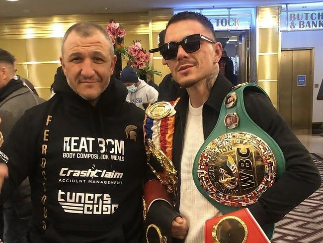 Mastermind trainer Michael Akkawy celebrates with new lightweight world champion George Kambosos Jr.