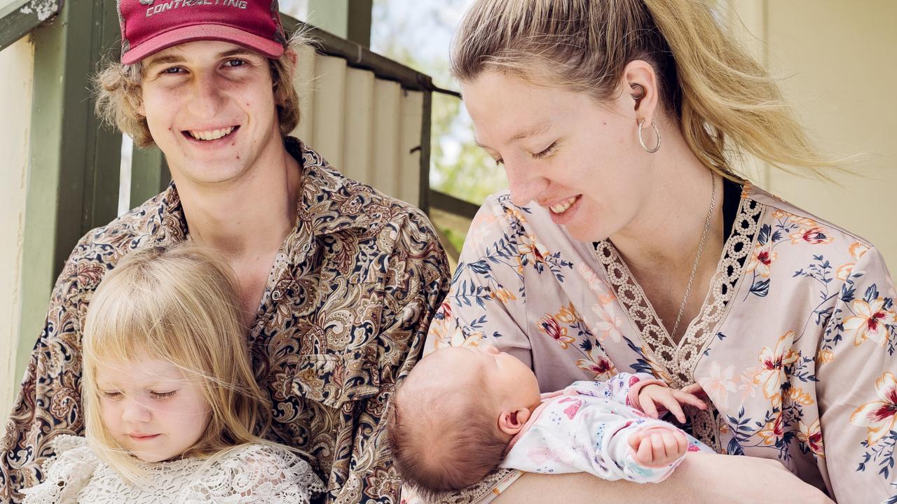 Greg and Chloe Childs with their daughters Myah, 3, and five-day-old Matilda. Picture: William Debois