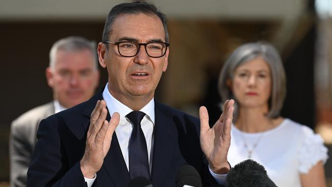 Premier Steven Marshall, flanked by SA Health Minister Stephen Wade and Professor Nicola Spurrier. Picture: Naomi Jellicoe