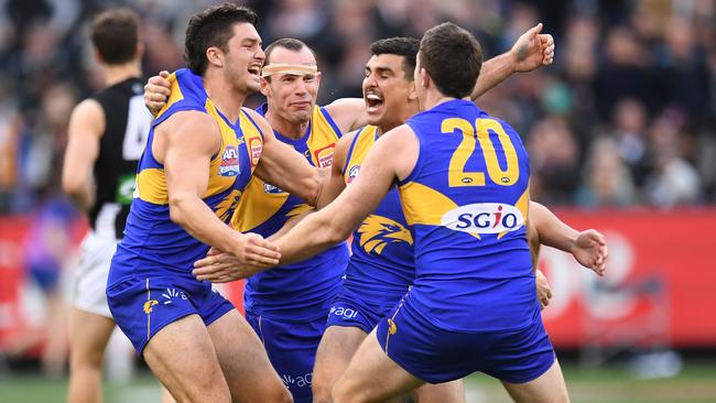 West Coast players celebrate on the final siren.