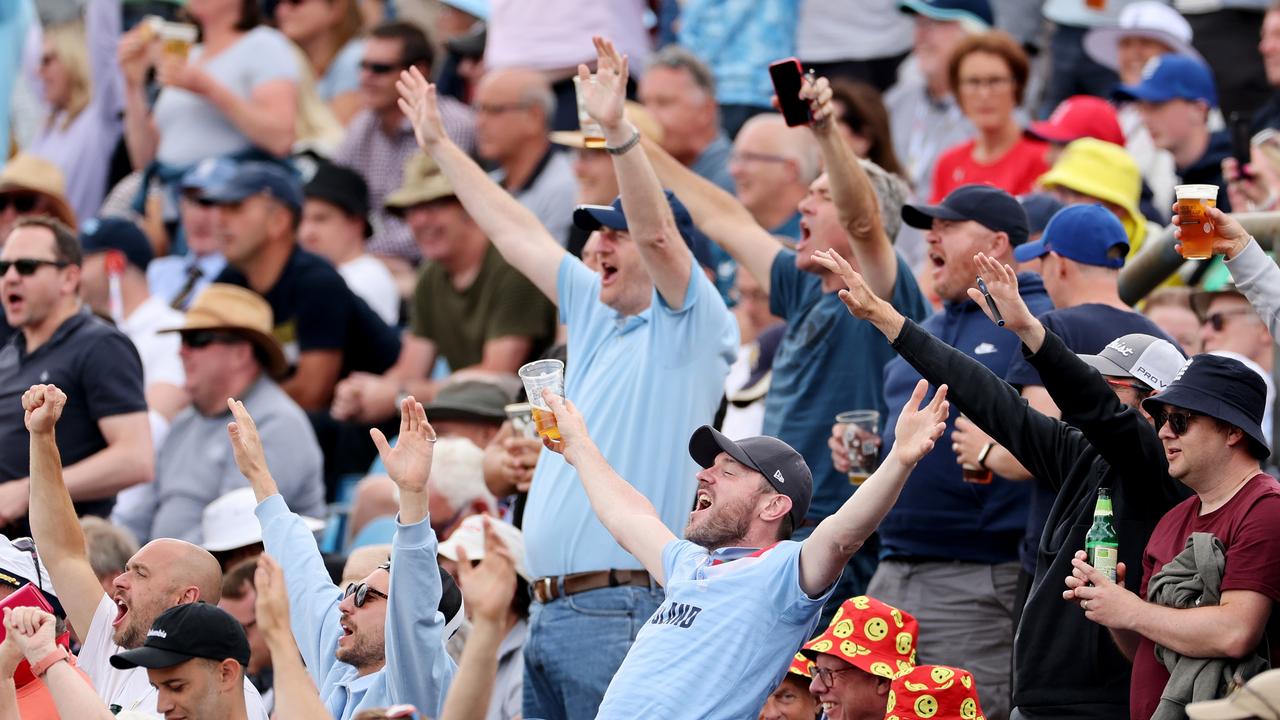 We can hear you: England fans are in full voice late on day two. Picture: Getty