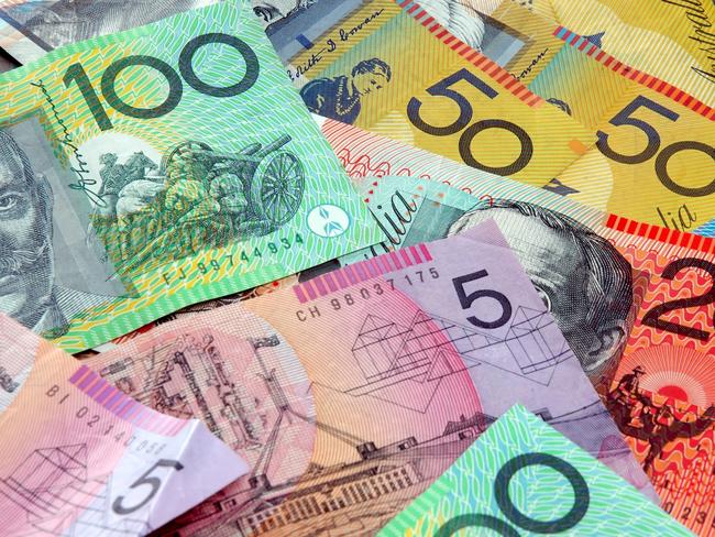 Australian notes scattered on a table. Notes, currency, generic money