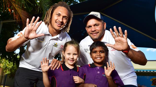 Former Cowboys players Ray Thompson and Matt Bowen with students Hailey Harris and Stephen Poynter. Picture: Shae Beplate