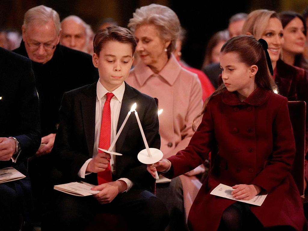 Prince George of Wales and Princess Charlotte were on their best behaviour. Picture: AFP