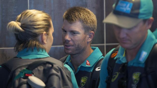 David Warner talks to coaching staff at the Cape Town International Airport. Picture: Halden Krog