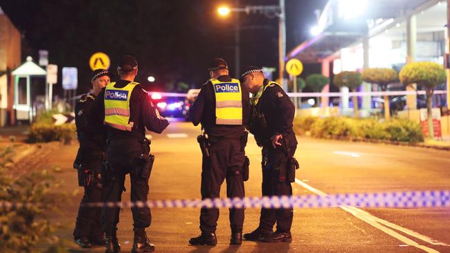 Police in Walpole St, Kew, where the man was shot dead. Picture: David Crosling