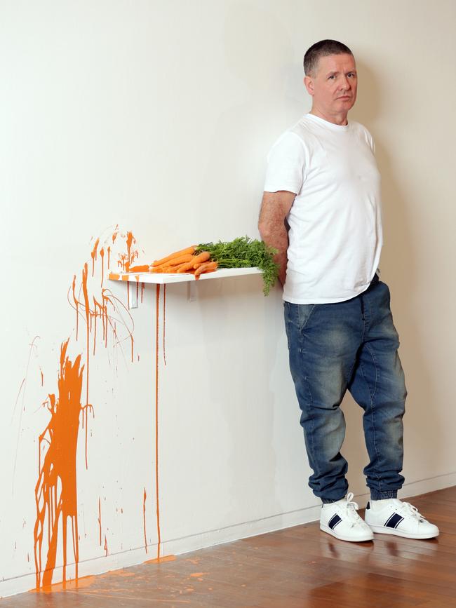 Jim Lambie at Roslyn Oxley9 Gallery in Paddington with his new work, 14 Carrot. Picture: Christian Gilles